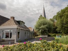 Vakantiehuisje Smoek Holwerd, aan de Waddenzee, помешкання для відпустки у місті Голверд