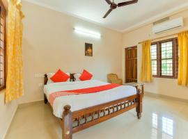 OYO 22767 Holidays Inn Wayanad, hotel v destinaci Pulpally