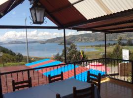 Lago de Tota Las Heliconias, cabaña o casa de campo en Aquitania