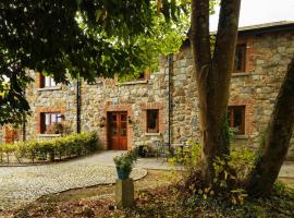 Croneybyrne Courtyard, cabana o cottage a Clara