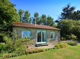 Whispering Pines Cottage, căsuță din Swyre