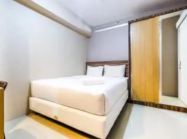 Classic 2BR Bassura City Apartment By Travelio