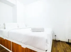 Modern and Comfy 3BR Bassura City Apartment By Travelio