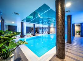 Wellton Riverside SPA Hotel, отель в Риге