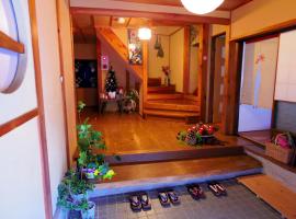 Guest House Motomiya, gistihús í Nakatsugawa