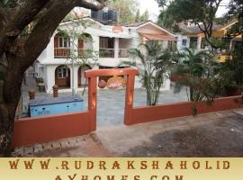Viesu nams Rudraksha Holiday Homes pilsētā Kandolima