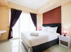 Bright and Stylish 1BR The Oasis Apartment Cikarang By Travelio