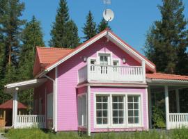 Коттедж в Финляндии, Enonkoski (розовый), hotel in Enonkoski