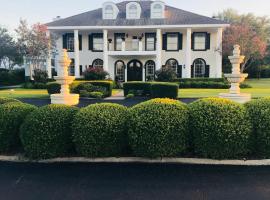 The Plantation House Boutique Inn, family hotel sa Pflugerville