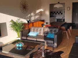 Appartement in residentie Silverbeach met binnenzwembad, hotel in De Haan