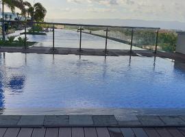 Mactan Newtown Condo with Garden and Ocean View 8NEWTOWN BLVD, hotel v destinaci Mactan