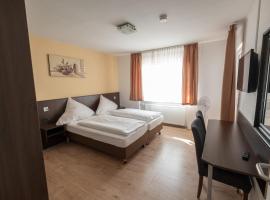 Schnitzelhaus und Pension Stadt Rosbach: Rosbach vor der Höhe şehrinde bir otel
