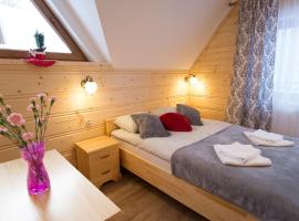Domki przy Potoku – hotel w mieście Suche
