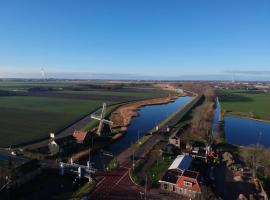 VAKANTIEHUISJE Bij de Molen tussen Alkmaar en Hoorn, cheap hotel in Oterleek