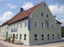 Viesnīca ar autostāvvietu Gasthof Grüner Baum pilsētā Oberlangfurth
