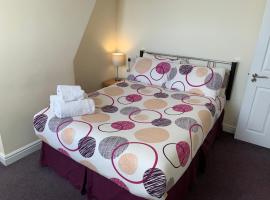 Austins Guest House, hotell i Cardiff