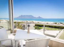 Luxury Private Beachfront 2 bedroom Dolphin Apartment, Blouberg, Cape Town