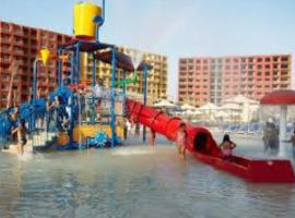 Amazing view apartment in Golf Porto Marina with marina access, hôtel à El Alamein