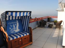 Terrassenhaus Penthouse-Wohnung 93, spahotell i Cuxhaven