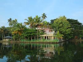 Orchid Lake View Homestay, homestay di Alleppey