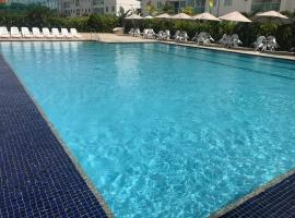 Flat Excelente em Porto de Galinhas PALM VILLAGE ACQUA frente para as piscinas, hotel near Shrimp Tecmares, Porto De Galinhas