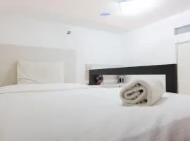 Elegant 2BR at 18th Floor Bassura City Apartment By Travelio