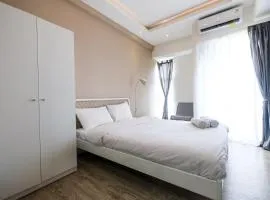 Modern Studio Akasa Pure Living BSD Apartment By Travelio