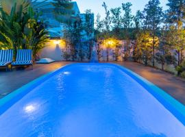 Casa Hibiscus Beach Club Ipioca Maceió, hotel in Maceió