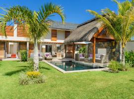 Clos du Littoral by Fine & Country, cottage sa Grand Bay