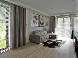 Apartament Baltica z ogródkiem - w ustronnym miejscu tuż przy plaży