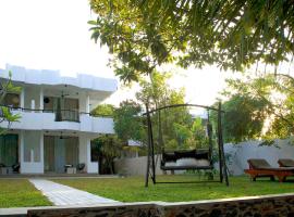 villa layanga - riverside guestrooms, מלון באלותגאמה
