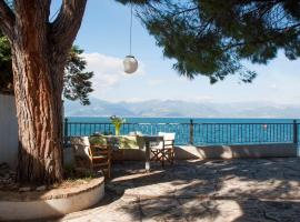 Sea front house on the beach, Peloponnese, cheap hotel in Kato Rodini
