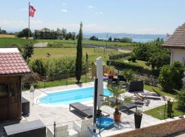 relaxe at home ds 3pc or studio furnished jacuzzi and pool in summer covered, hotel in Bevaix