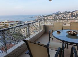 Christos house-- Comfortable apartment with great view and private parking !