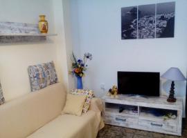 A cozy flat in the heart of El Fraile, casă de vacanță din Las Galletas
