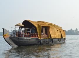 Thara's Houseboat, hótel í Alleppey