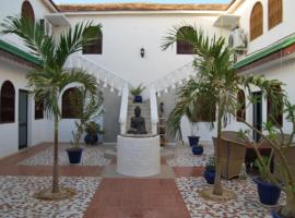 Riad côté jardin, khách sạn gia đình ở Saly Portudal