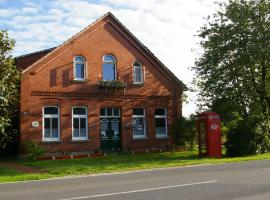 Das Haus mit der roten Telefonzelle, hotel in Apen