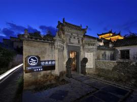 Shi Ting Hua Yi Villaggio Hotel, hotel v destinaci Yi