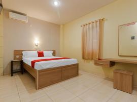 RedDoorz Plus near Pantai Malalayang Manado, hotel in Manado