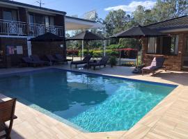 Logan City Motor Inn, hotel con piscina en Slacks Creek