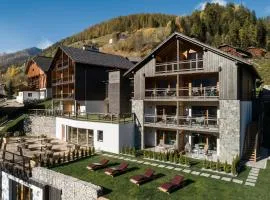 Les Dolomites Mountain Lodges