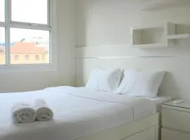 Modest 1BR Apartment at Parahyangan Residence By Travelio