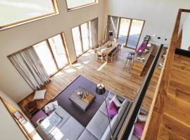 Gud Jard Chalet Nr 37 - Design-Ferienhaus mit exklusiver Ausstattung, hotel in Pellworm