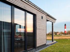 Gud Jard Lodge Nr 19 - Design-Ferienhaus mit exklusiver Ausstattung, Hotel in Pellworm