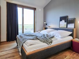 Gud Jard Lodge Nr 27 - Design-Ferienhaus mit exklusiver Ausstattung, aluguel de temporada em Pellworm