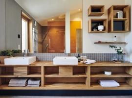 Gud Jard Lodge Nr 32 - Design-Ferienhaus mit exklusiver Ausstattung, Hotel in Pellworm