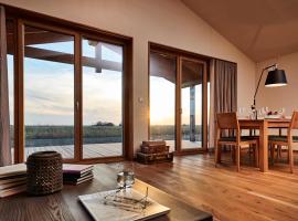 Gud Jard Lodge Nr 33 - Design-Ferienhaus mit exklusiver Ausstattung, Hotel in Pellworm