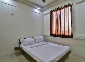 SPOT ON 37726 Hotel Patang, hotel i Gandhinagar