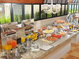 Cosmos Hotel, hotel v destinaci Caxias do Sul